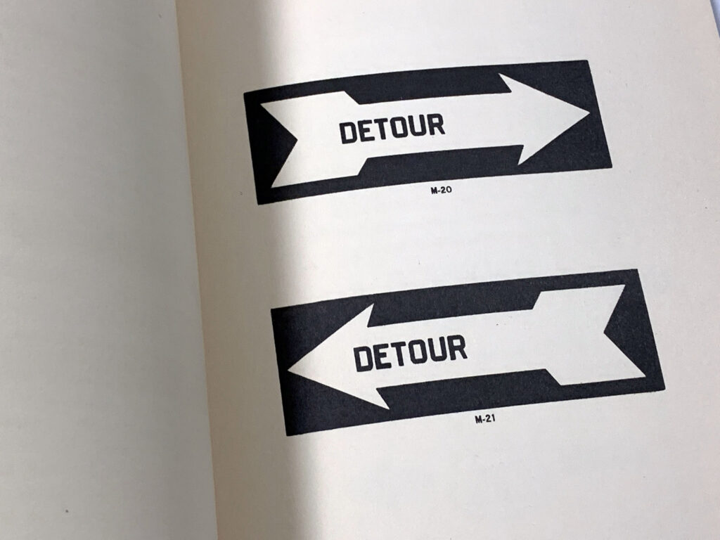 Manual page showing detour arrow sign designs.