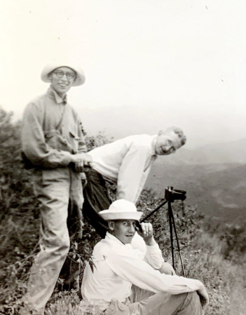 Theodore Watson Forbes photographed outdoors with companions.