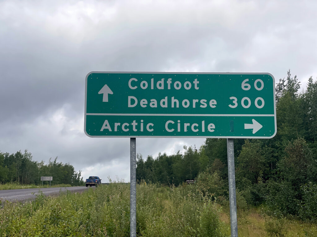 Road sign pointing to Coldfoot, Deadhorse, and the Arctic Circle