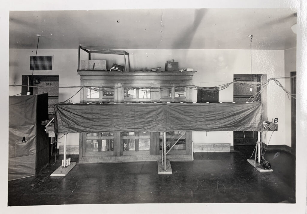 Photograph of an early driving simulator or laboratory test setup.