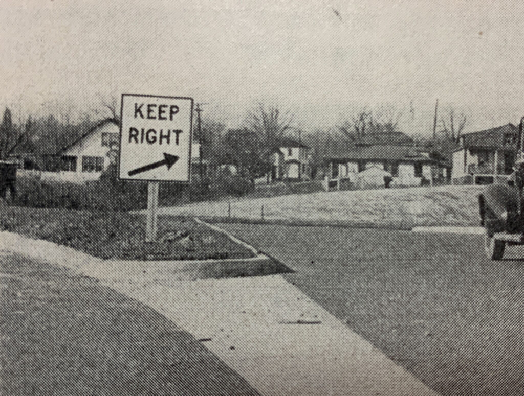 Archival photograph showing a Keep Right sign along the Pentagon road system.