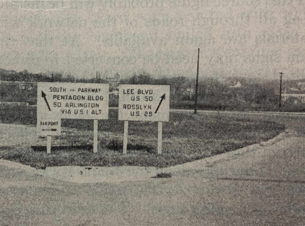Archival photograph of paired directional guide signs from the Pentagon Road Network study.